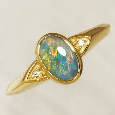 18k Yellow Gold Ring with two diamonds and a BLACK OPAL Sparkling bright orange and green over blue